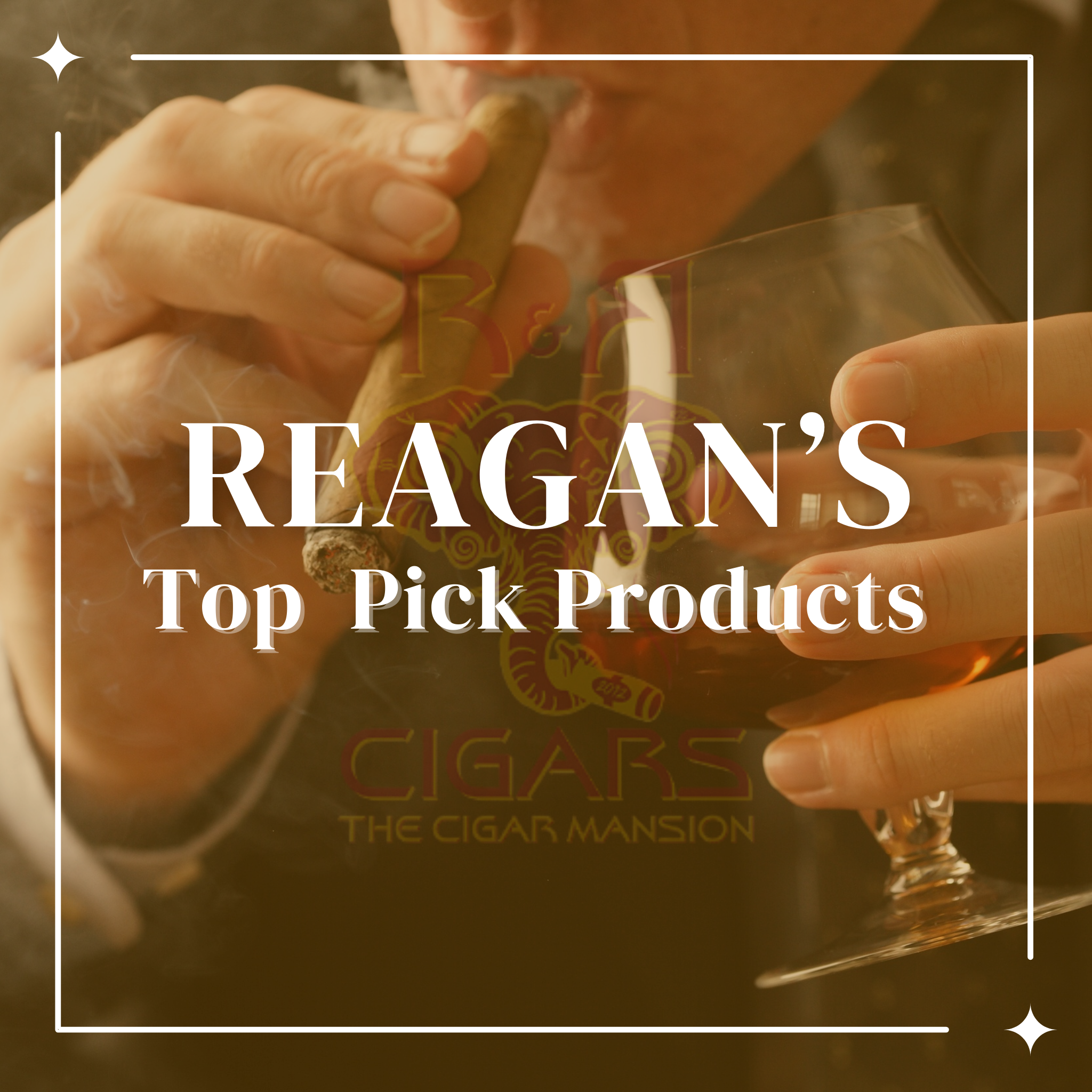 Hand holding a glass of whiskey in a cigar lounge setting, representing Reagan’s top pick cigar and accessory products at RandR Cigars.